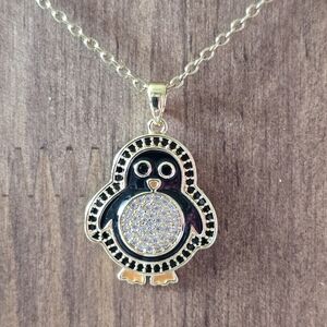 Gold Plated Penguin Necklace With Enamel And Cubic Zirconia